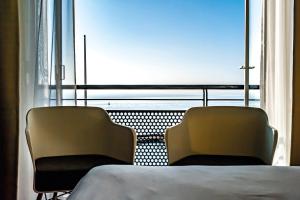 Postel nebo postele na pokoji v ubytování Fletcher Hotel-Restaurant Arion-Vlissingen