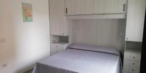 Posteľ alebo postele v izbe v ubytovaní Casa Vacanze da Mary P