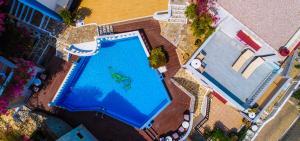 Πισίνα στο ή κοντά στο One Private Studio with stunning full sea view, shared pool and Ac