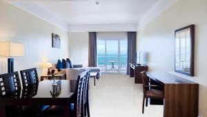 A seating area at Ramada by Wyndham Beach Hotel Ajman