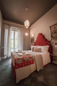 Un pat sau paturi într-o cameră la La Fonderia Firenze