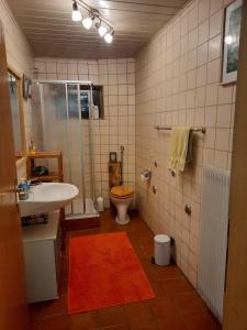 Ванная комната в Ferienwohnung Nikoll/Simon