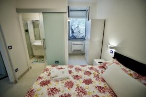 Кровать или кровати в номере Ambra Apartment