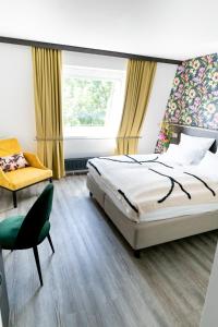 Postel nebo postele na pokoji v ubytování Luxstay Karben - Self-Check-In
