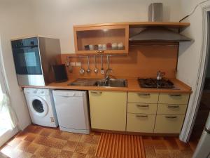 Kuchyň nebo kuchyňský kout v ubytování Casa Gori
