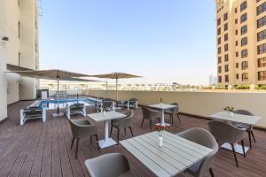 S19 Hotel-Al Jaddaf Metro Station 레스토랑 또는 맛집
