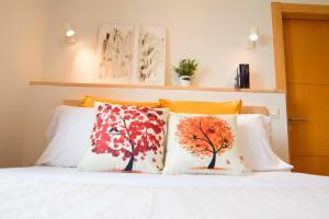Säng eller sängar i ett rum på Letmalaga Sea Pacific