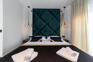 Postel nebo postele na pokoji v ubytování Luxury penthouse Vagabundo