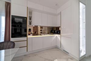 Kuchyň nebo kuchyňský kout v ubytování Luxury penthouse Vagabundo