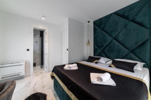 Postel nebo postele na pokoji v ubytování Luxury penthouse Vagabundo