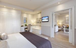 Postel nebo postele na pokoji v ubytování Hotel RIU Garoé