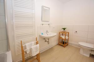 Koupelna v ubytování Alpenblick - modernes und großzügiges Apartment + 6 fotografií