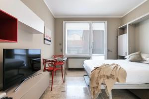 TV a/nebo společenská místnost v ubytování Contempora Apartments - Elvezia 8 - E31