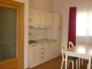 Kuchyň nebo kuchyňský kout v ubytování Relais Villa Giulia