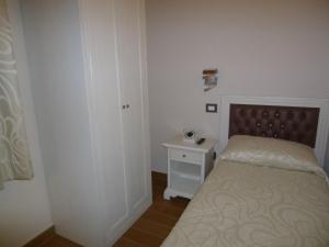 Postel nebo postele na pokoji v ubytování Relais Villa Giulia