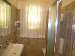 Koupelna v ubytování Relais Villa Giulia + 22 fotografií