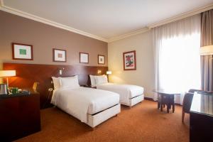 Letto o letti in una camera di Hotel Atlantic Agdal