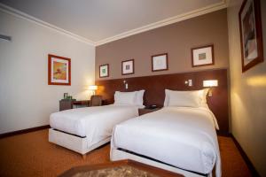 Letto o letti in una camera di Hotel Atlantic Agdal