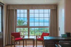 Posezení v ubytování Aria Hotel
