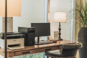 TV a/nebo společenská místnost v ubytování Aria Hotel