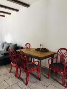 a dining room with a wooden table and chairs at Na Červené louce relax 2 in Cheb +13 photos