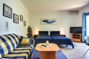 Giường trong phòng chung tại Apartments Villa Ana