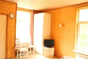 TV a/nebo společenská místnost v ubytování Tientaus 1 Apartments