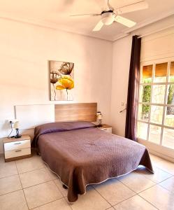 Llit o llits en una habitació de Villa Bella Cala
