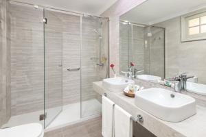Koupelna v ubytování Hotel RIU Garoé