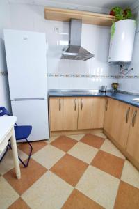 A kitchen or kitchenette at Letmalaga Popolo & Parking