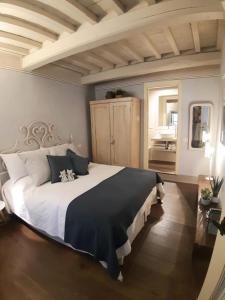Postel nebo postele na pokoji v ubytování Noi Due a Cortona