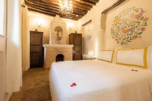 Riad Palais Des Princesses & Spa客房内的一张或多张床位