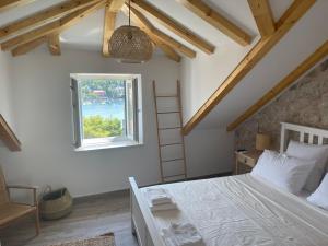 Postel nebo postele na pokoji v ubytování Villa Piscitelli