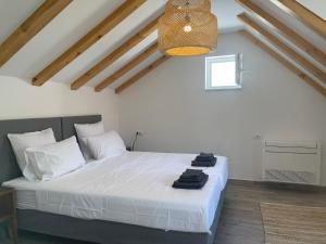 Postel nebo postele na pokoji v ubytování Villa Piscitelli