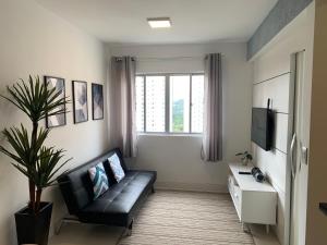 Μια τηλεόραση ή/και κέντρο ψυχαγωγίας στο 1103- Apartamento Encantador, amplo e decorado, mobiliario moderno, cozinha completa com utensílios , Excelente vista da cidade e localização privelegiada no bairro Bigorrilho