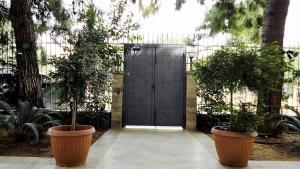 A garden outside Vacations in Patra Rooms