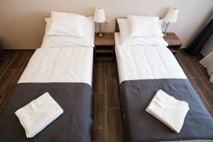 Voodi või voodid majutusasutuse MP hotel toas