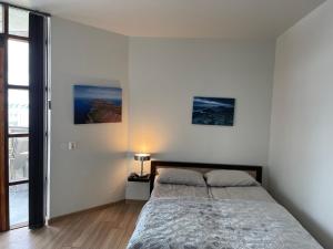 Ліжко або ліжка в номері Helgrindur Guesthouse