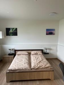Ліжко або ліжка в номері Helgrindur Guesthouse