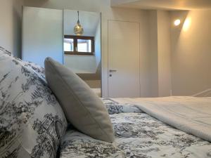 Postel nebo postele na pokoji v ubytování Apartman Mujo