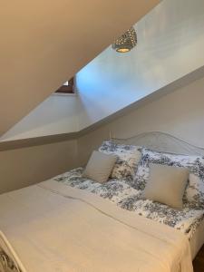 Postel nebo postele na pokoji v ubytování Apartman Mujo