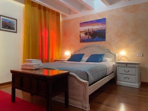 Ένα ή περισσότερα κρεβάτια σε δωμάτιο στο Cà di Pizzo di Burano