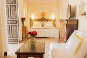 Riad Palais Des Princesses & Spa客房内的一张或多张床位