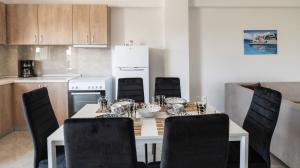 A cozinha ou cozinha compacta de Mythic Villas