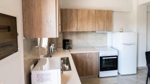A cozinha ou cozinha compacta de Mythic Villas