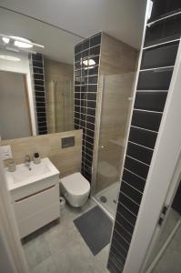 Kúpeľňa v ubytovaní JDK Apartamenty Mickiewicza 34m2 4-osobowy