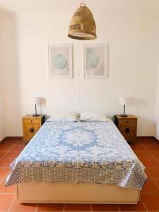 A bed or beds in a room at Casa Campinho