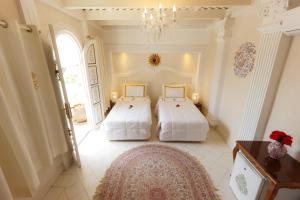 Riad Palais Des Princesses & Spa客房内的一张或多张床位