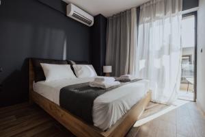 Postel nebo postele na pokoji v ubytování YaMa Villas