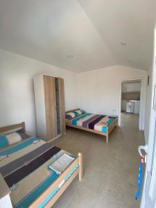 Postel nebo postele na pokoji v ubytování Apartments Beho